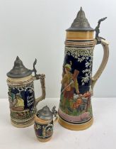 3 vintage ceramic German lidded steins all with traditional scenes. To include a very large 3