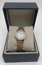 A boxed Ted Baker Fitzrovia Charm wristwatch, complete with tags, protective plastic coverings and