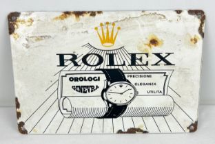 A small rectangular shaped enamelled metal wall advertising sign for Rolex. Approx. 20cm x 30cm.