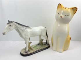 2 very large vintage ceramic items. An ornament of a horse (approx. 33.5cm tall) together with an