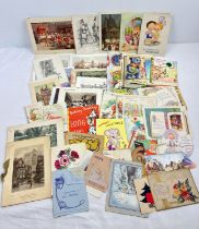 A box of assorted vintage greetings cards, of varying designs and styles.