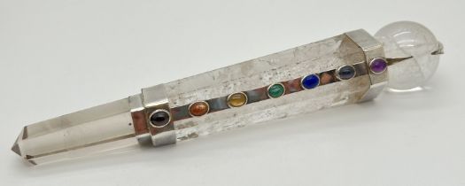 A clear quartz polished healing Chakra wand with clear quartz sphere to top and various semi