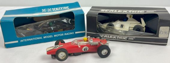 2 boxed and 1 unboxed Scalextric model racing cars. C.120 Martini Brabham BT 44B, C.123 UOP Shadow