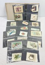 An album of approx. 95 assorted Victorian and Edwardian greetings cards, in varying styles and