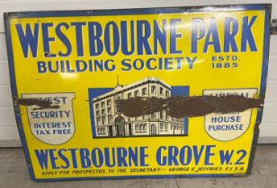 A large vintage enamel advertising sign for Westbourne Park Building Society in blue, yellow and