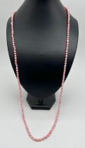 A 35" string of pink dyed freshwater pearls. Retired Jewellery makers stock.