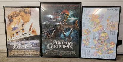 2 framed & glazed movie posters to include Titanic and Pirates of the Caribbean together with a