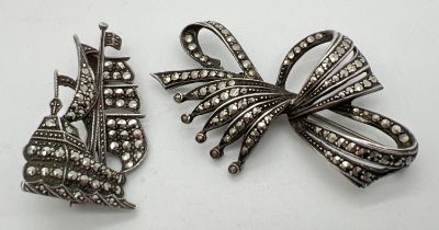 2 vintage silver brooches, both set with marcasite stones. A decorative bow brooch together with a