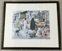 A limited edition Bahraini print of Manama market, signed and numbered in pencil to margin. Frame