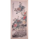 A Chinese 'Peonies' scroll painting, L 134,5 - W 54 cm