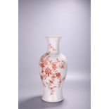 A Chinese iron-red 'Flower garden' Guanyin ping baluster vase, H 44,4 cm