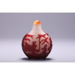 A Chinese glass snuff bottle, H 6,6 cm