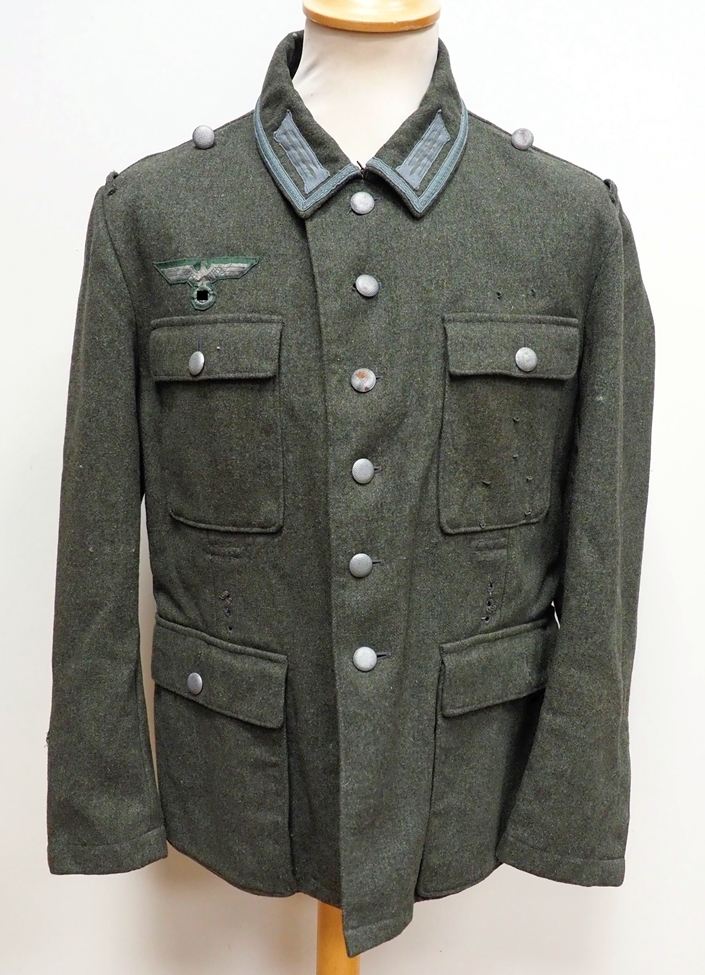 Wehrmacht: Feldjacke M43 eines Unteroffiziers - Kammerstück.