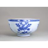A Blue and White Floral Punch Bowl, Yongzheng/Qianlong, the rounded thick body exquisitely painted