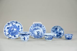 Three Blue and White Cups and Saucers, Kangxi, including one small cup and saucer with petal