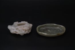 Two Jade Brushwashers, 19th/20th century, comprising a celadon jade hollow pine and a lobed sage