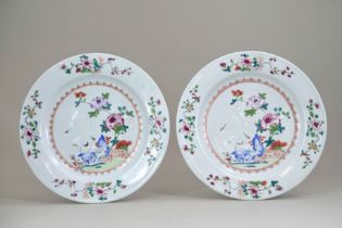 A Pair of 'Crane and Peony' Plates, Qianlong, with a central medallion enclosed by gilt spearhead at