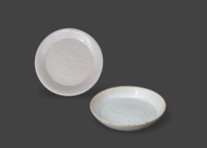 A Qingbai Carved dish and a Ding carved dish, Song dynasty, the Qingbai dish carved in the