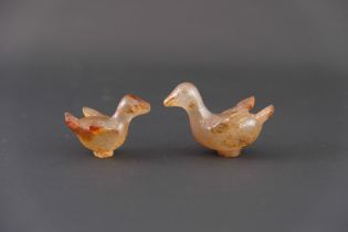 Two Agate Ducks, Han dynasty, each depicted flying with outspread wings, with incised detailing to