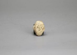 A Rare moulded Pottery Human Face, Hong Shan culture, c.1900 B-CELL, A Rare moulded Pottery Human