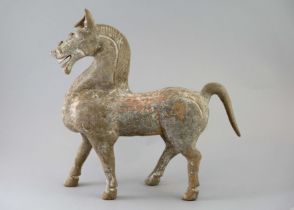 A Fine Painted Pottery Horse, Han dynasty, horse moulded in walking posture, with arched neck,