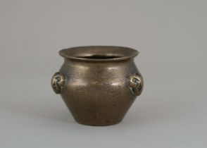A Silver inlaid Bronze Waterpot, 17th century, in the form of a miniature fishbowl, with three