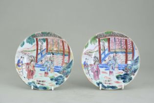 A Pair of 'famille rose' Dishes with Figures, 19th century, well enamelled with a young official,