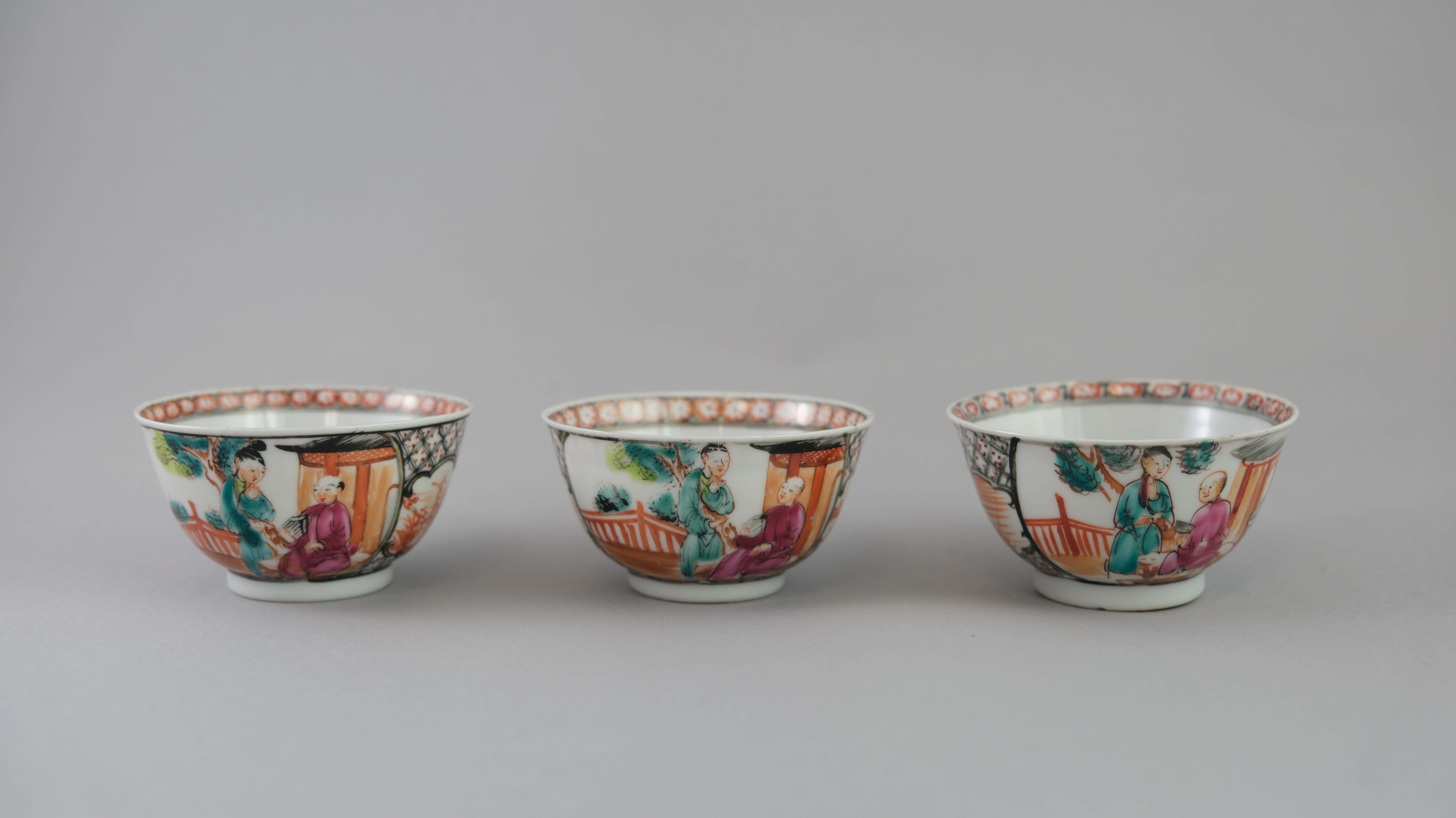 A Set of Six 'Mandarin Palette' Cups and Saucers, Qianlong, with a central family lakeside terrace - Image 2 of 20