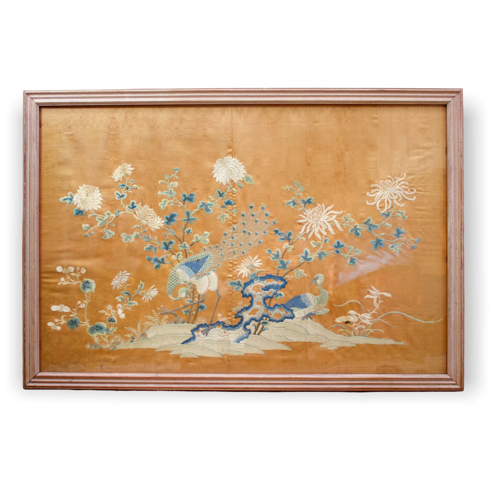 An Embroidered silk Panel, mid Qing dynasty, embroidered on the amber silk field in muted tones with