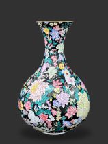 A Canton Enamel Millefleur Vase, Republic period, of pear shape with waisted neck flaring to the