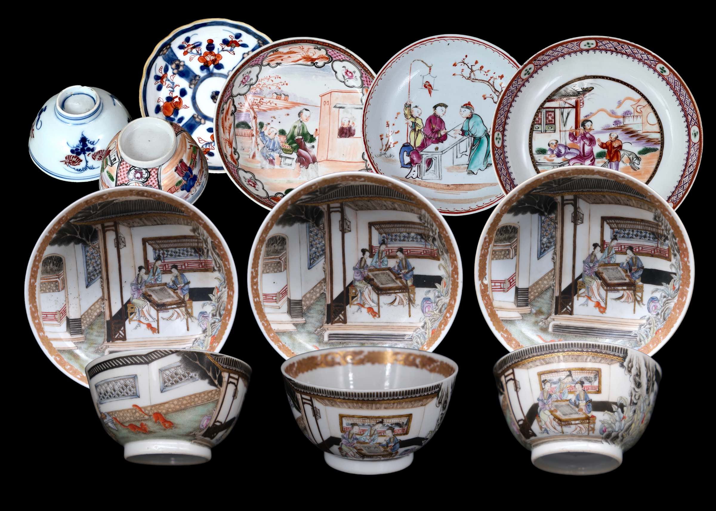 A Group of 'famille rose' Cups and saucers, Yongzheng/Qianlong, including three cups and saucers