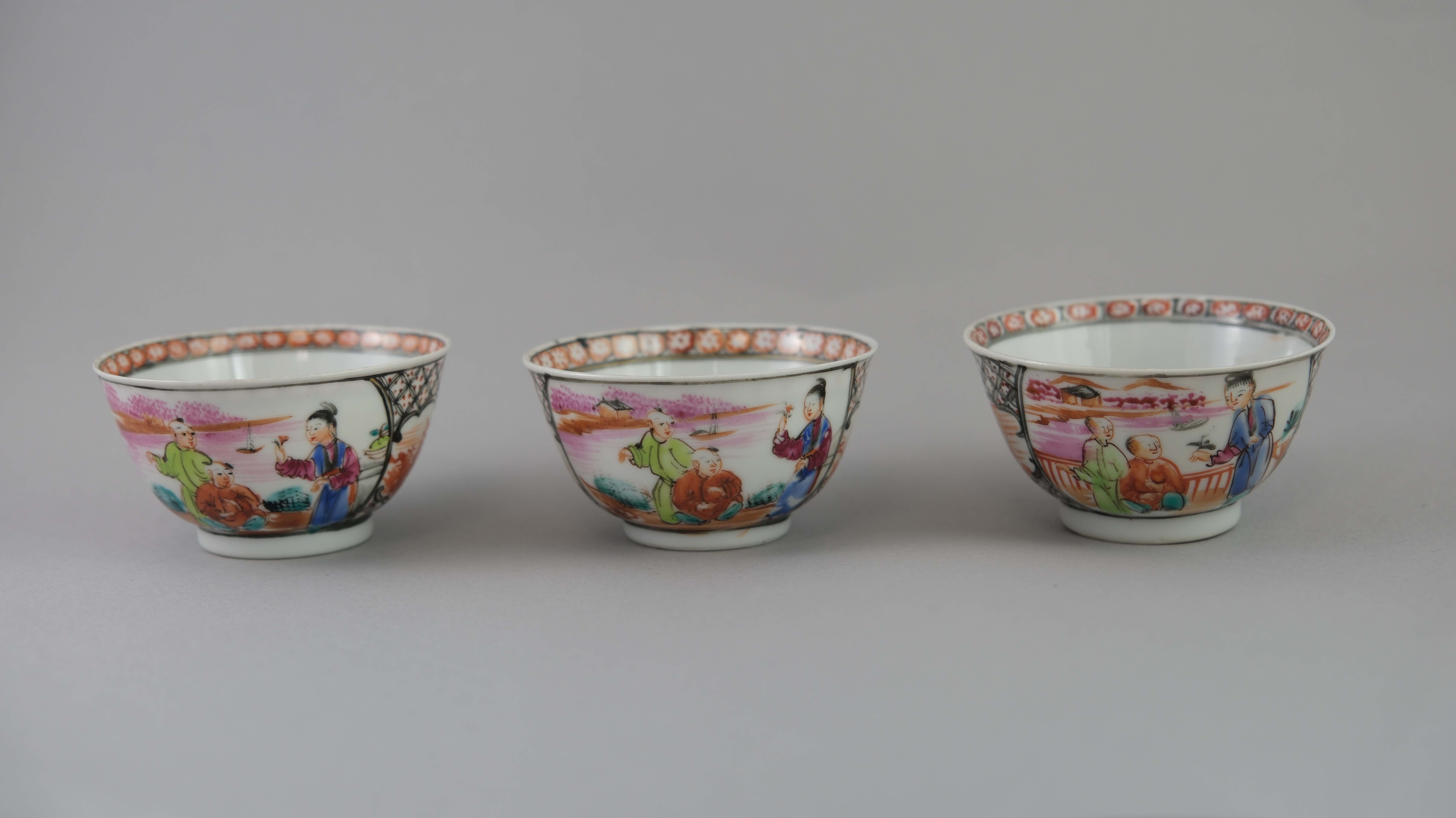 A Set of Six 'Mandarin Palette' Cups and Saucers, Qianlong, with a central family lakeside terrace - Image 4 of 20