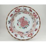 A Large 'famille rose' Peony Plate, Yongzheng, well enamelled with a central pink peony, the everted