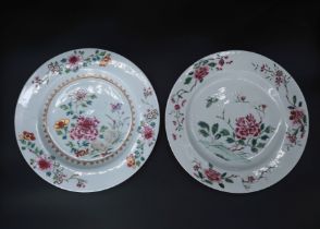 Two 'famille rose' Plates with Flowers, Qianlong , similarly decorated with peonies, one with a gilt