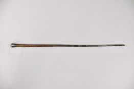 A Silver mounted Rhinoceros Horn Cane, 18th/19th century, the gentleman's cane of slender form, with