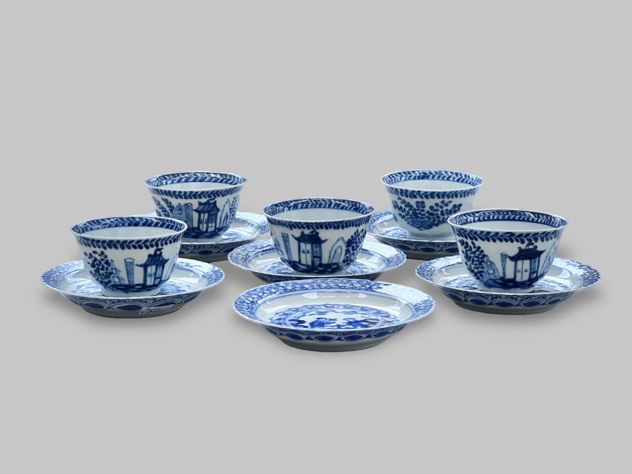 Five blue and white cups and saucers, 18th/19th century, and another saucers, Five blue and white