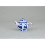 A Miniature Blue and White Teapot and a Cover, Kangxi, , the sides moulded with panels painted