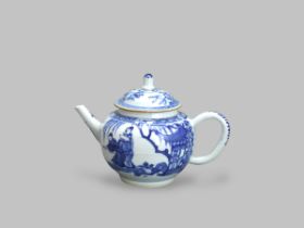 A Blue and White 'Figures'Teapot and a Cover, Kangxi, the rounded sides with a continuous scene of