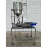Universal Posifill Semi-Automatic Volumetric 2-Head Liquid Filler fitted into S/S trolley