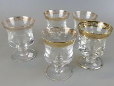 8 Gläser, Kristallglas, Goldrand, geätztes Blumendekor, H. ca. 11 cm