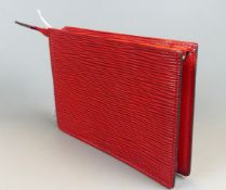 Louis Vuitton Rote Epi Pochette, mit Reisverschluss, ca. 10,5 x 15 cm