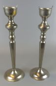 Paar Kerzenleuchter/Windlichter (fehlende Glaseinsätze), versilbert, H. ca. 35 cm