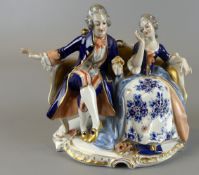 Barockes Paar, Porzellanfiguren, polychrom bemalt, Goldstaffage,
