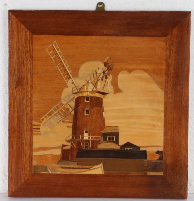 A 20th century marquetry mixed wood inlaid panel depicting Cley Windmill, integral frame border,