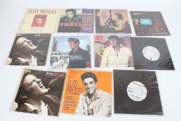 A collection of approx. 11 Elvis Presley 7" singles (80s, 90s, 2000s). MB collected 24/1/23 K8