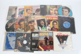 A collection of approx. 20 Elvis Presley 1980s singles MB collected 24/1/23 K8