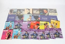 A collection of Elvis Presley sampler CDs and DVDs