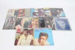 A collection of approx. 18 Elvis Presley 1980s single releases MB collected 24/1/23 K8