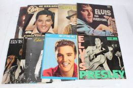 A collection of approx. 10 Elvis Presley LPs to include Elvis In Concert ( PL 02587(2) )