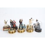 Eleven Elvis Presley music boxes, to include three modelled as Elvis standing on record players,